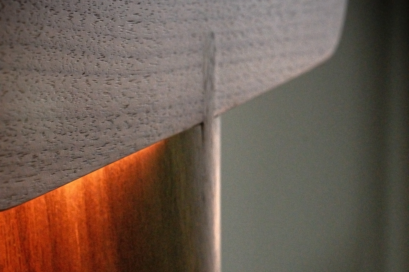 A detailed close-up of the wooden lamp shade.