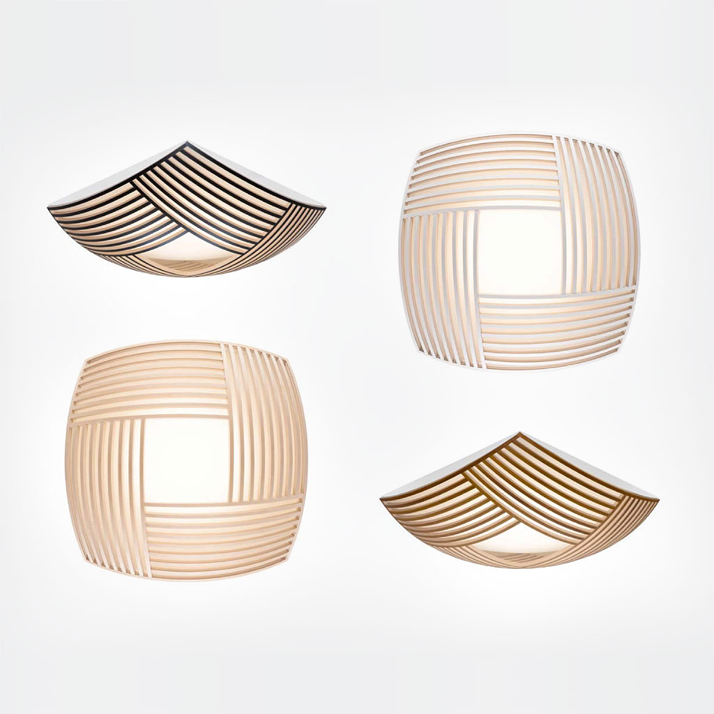 The Kuulto ceiling lamp in black laminate and walnut veneer from the side, white laminate and natural birch from the front.